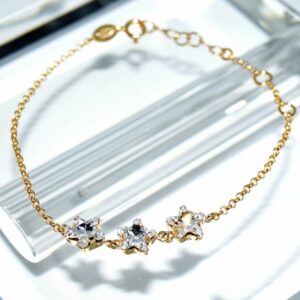 SX00568þBRACELET STARS DORE SWAROVSKI