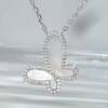 RI01122þCOLLIER PAPILLON NACRE